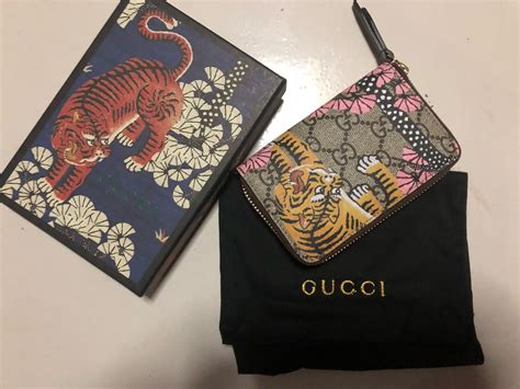 tiger gucci wallet fake|Gucci bengal tiger wallet.